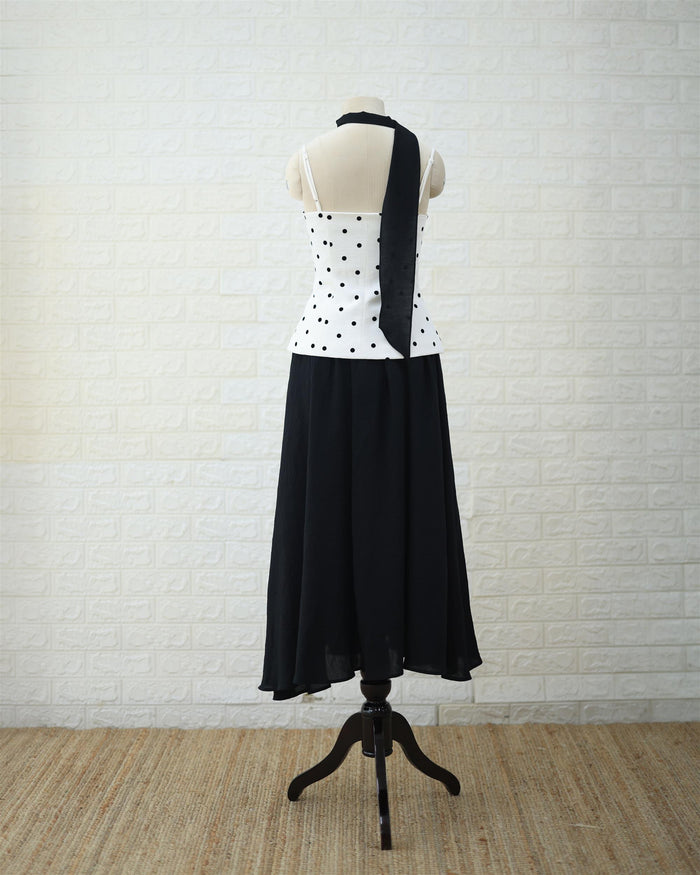 Monochrome Polka Peplum Top & Black Maxi Skirt Set in White / Black, side view